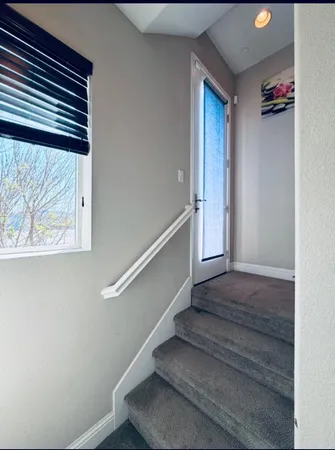 a view of entryway with wooden floor