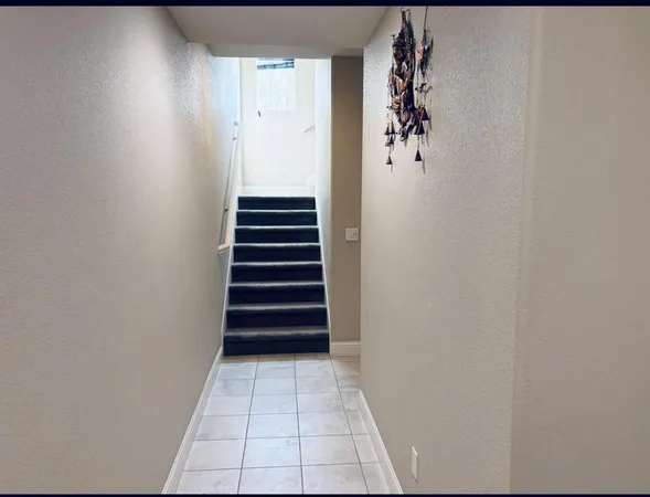 a view of entryway with stairs