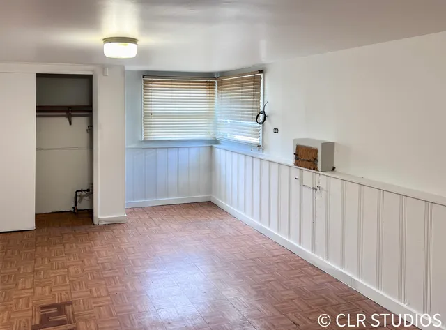 a view of a hallway with closet