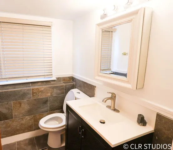 a bathroom with a sink and a toilet