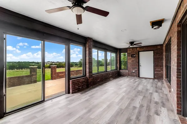 a view of a room with a large window