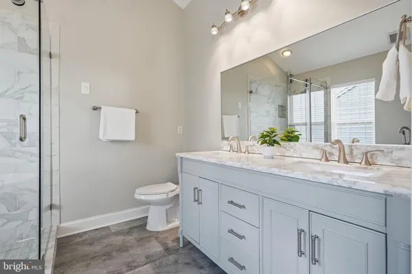 a white bath tub sitting in a bathroom