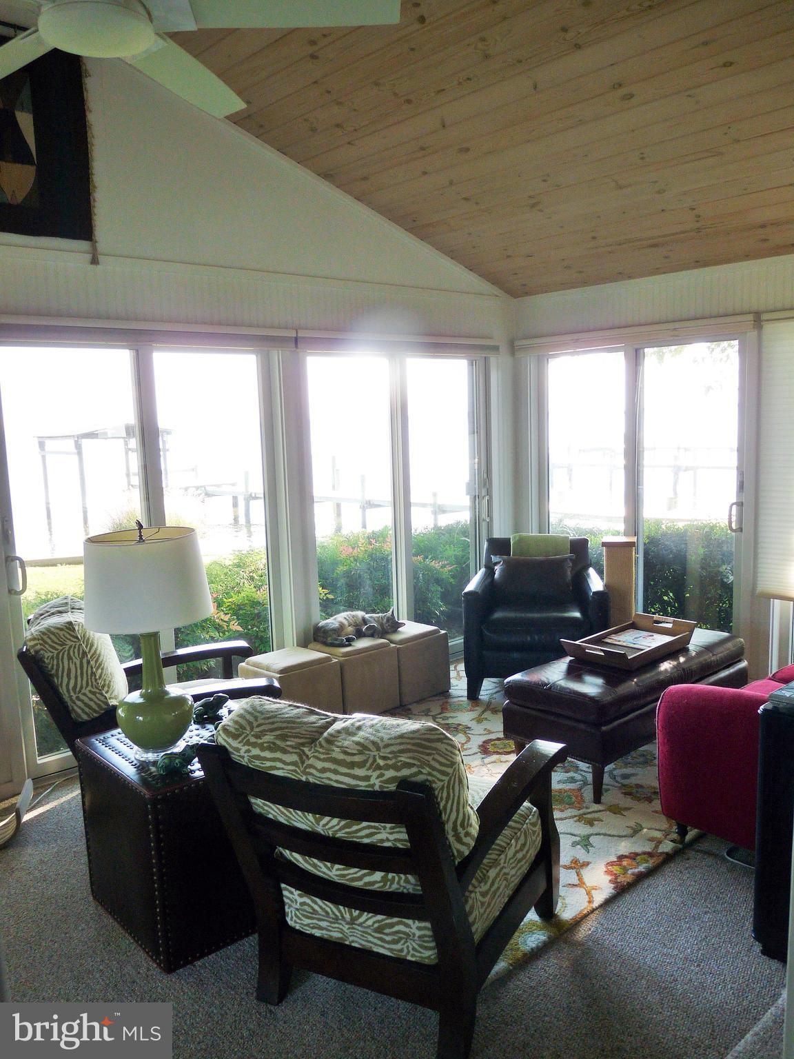 102 Point Road Stevensville, MD 21666 - Photo 11 of 41 Extra entertaining space in the sunroom