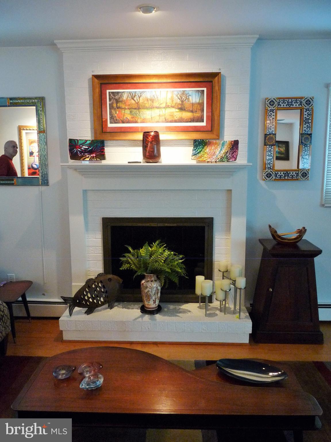102 Point Road Stevensville, MD 21666 - Photo 21 of 41 Beautiful fireplace w/ accent lighting