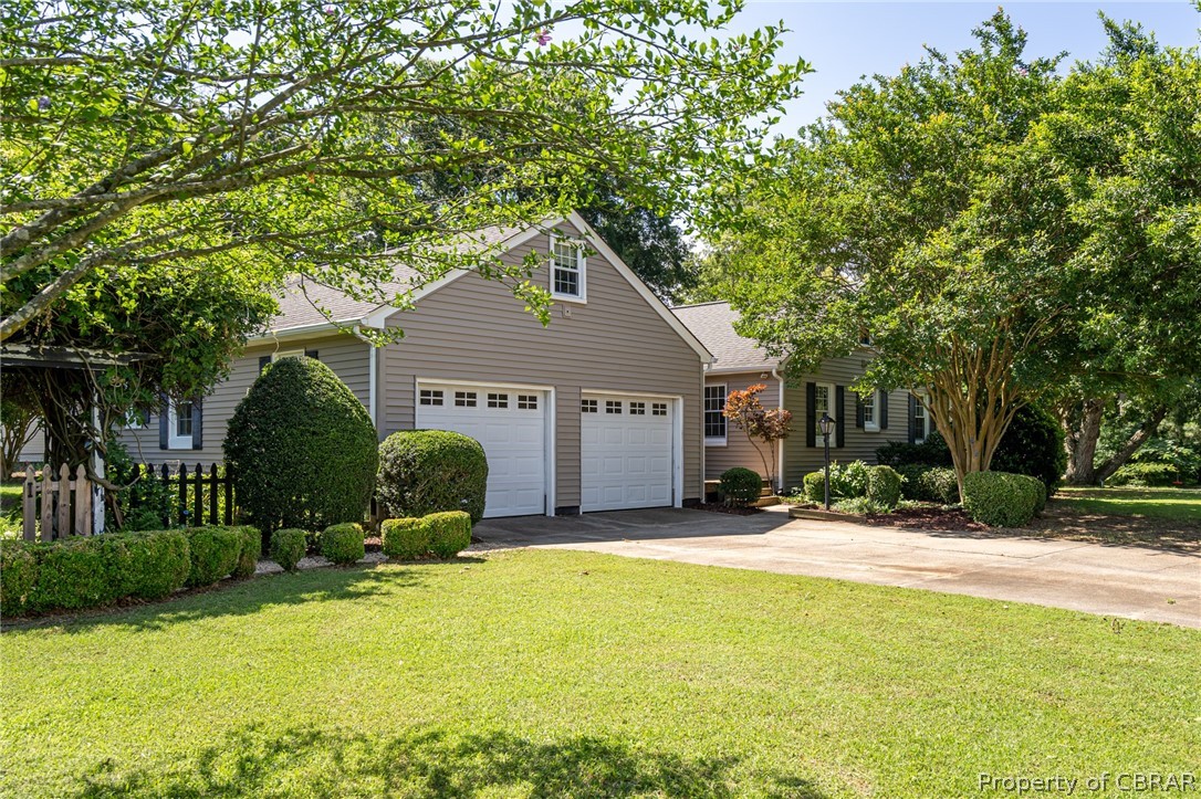 1461 Tarleton Road Gloucester Point, VA 23062 - Photo 6 of 40 Spacious 2-car garage with storage above