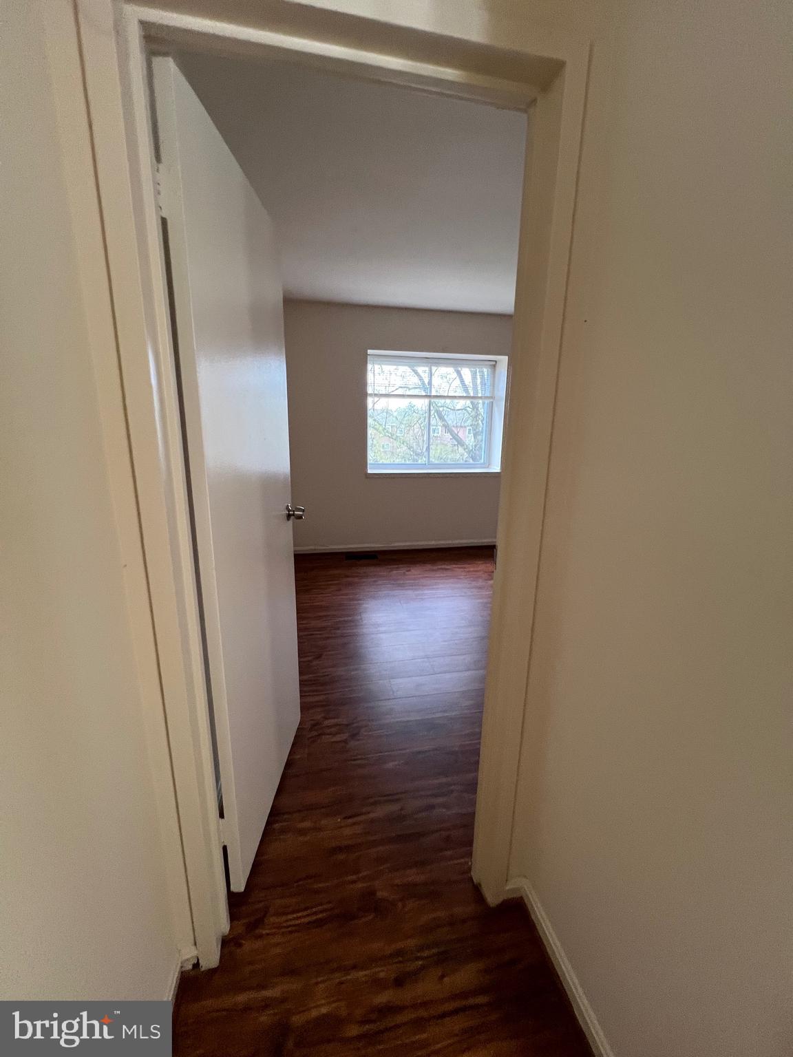4645 Logsdon Drive Annandale, VA 22003 - Photo 13 of 20 a view of a hallway with wooden floor