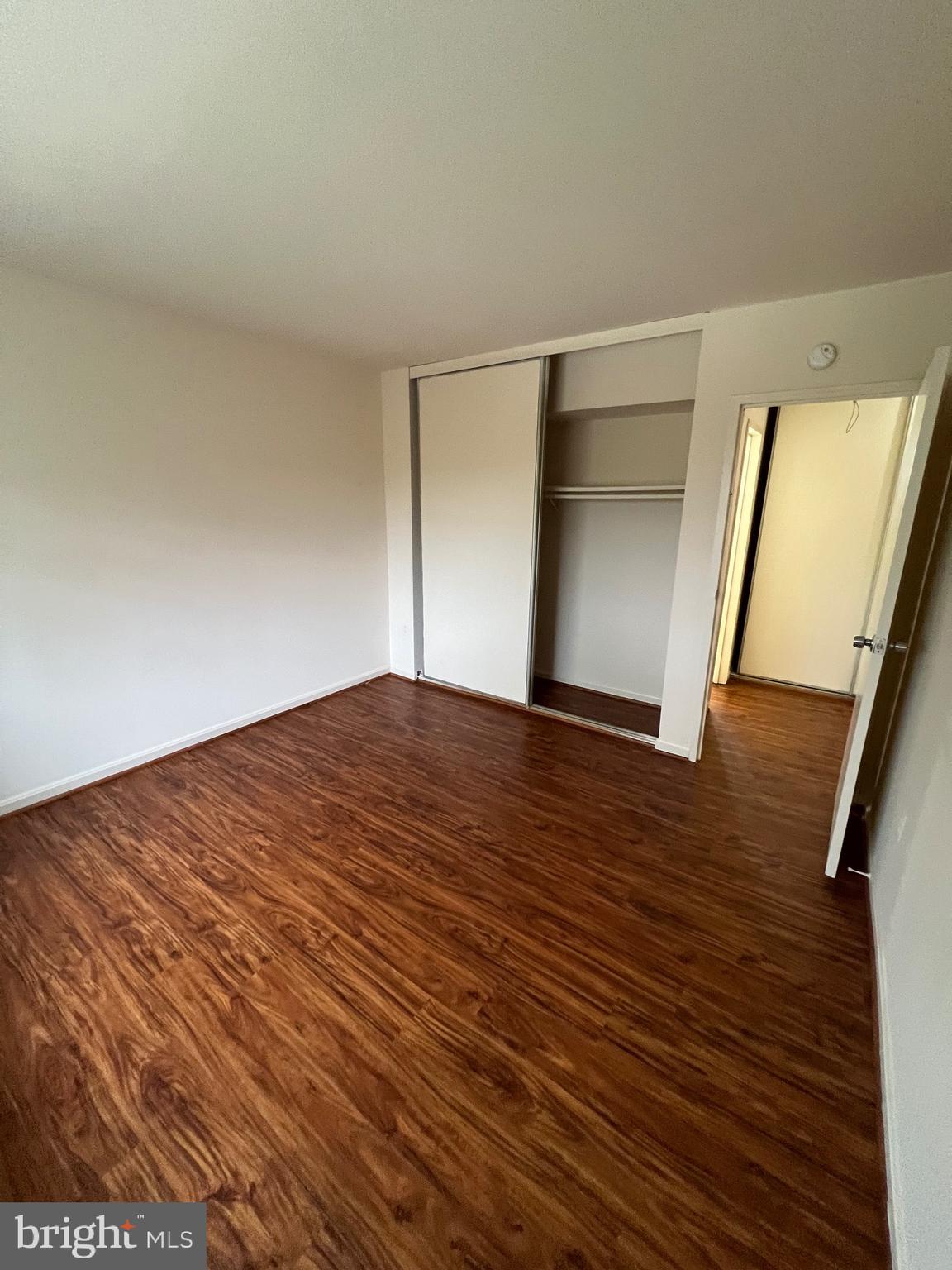 4645 Logsdon Drive Annandale, VA 22003 - Photo 15 of 20 a view of empty room with wooden floor