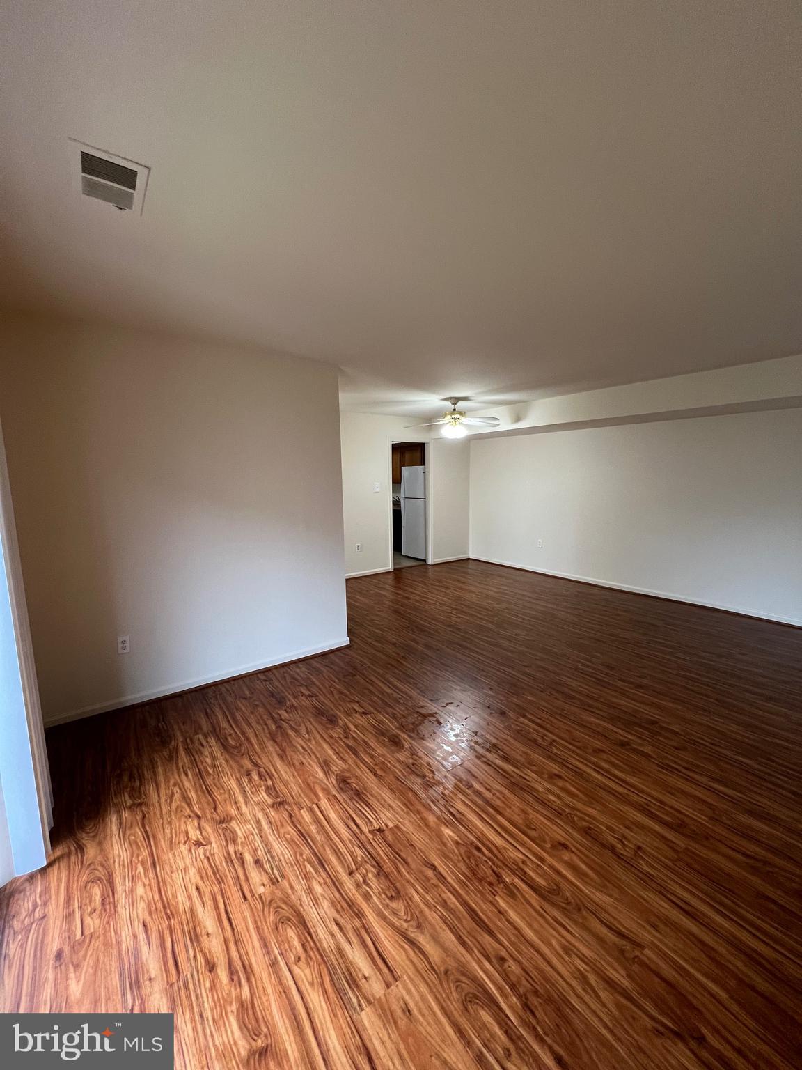 4645 Logsdon Drive Annandale, VA 22003 - Photo 10 of 20 a view of empty room with wooden floor