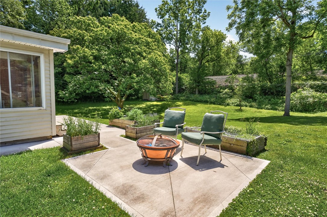 115 Crescent Road Perinton, NY 14450 - Photo 5 of 31 Patio off the 3-Season Enclosed Porch