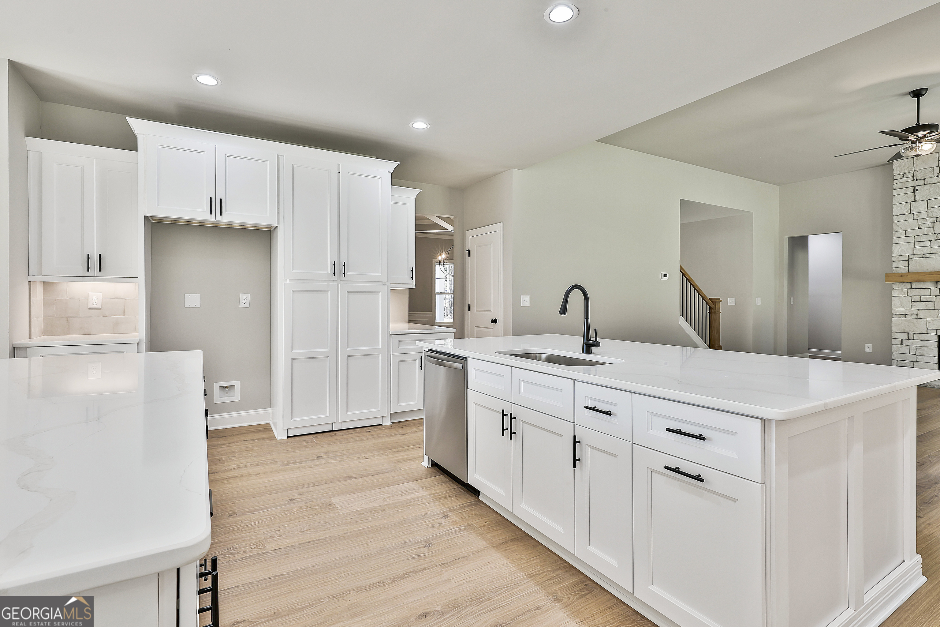 779 Alex Stephens Road Moreland, GA 30259 - Photo 21 of 54 a kitchen with white cabinets and refrigerator