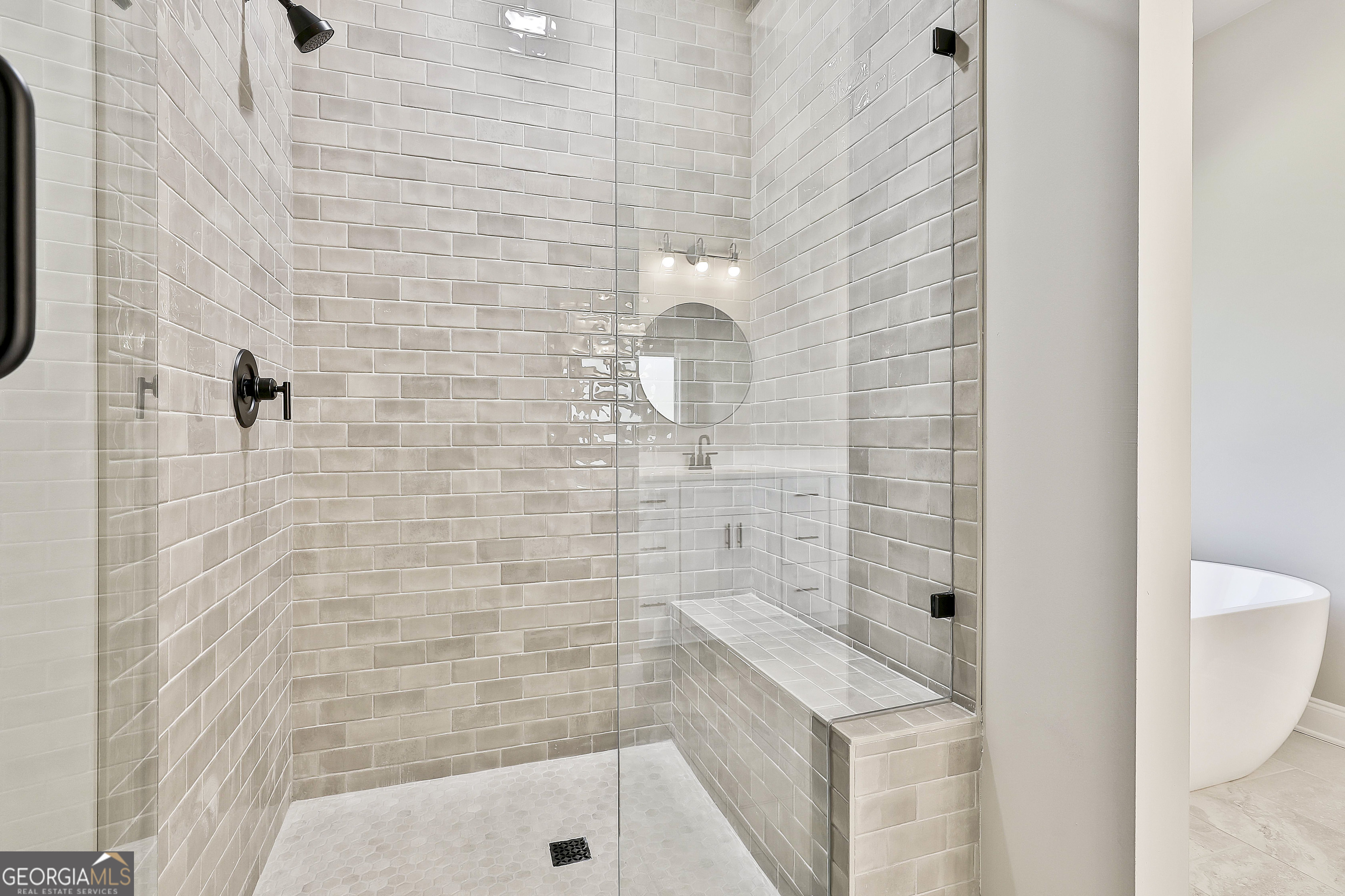 779 Alex Stephens Road Moreland, GA 30259 - Photo 35 of 54 a bathroom with a sink and a shower