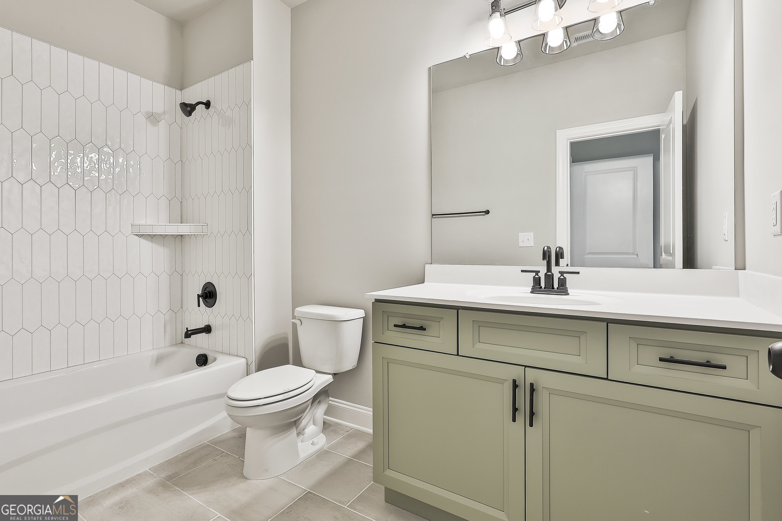 779 Alex Stephens Road Moreland, GA 30259 - Photo 38 of 54 a bathroom with a sink toilet and shower