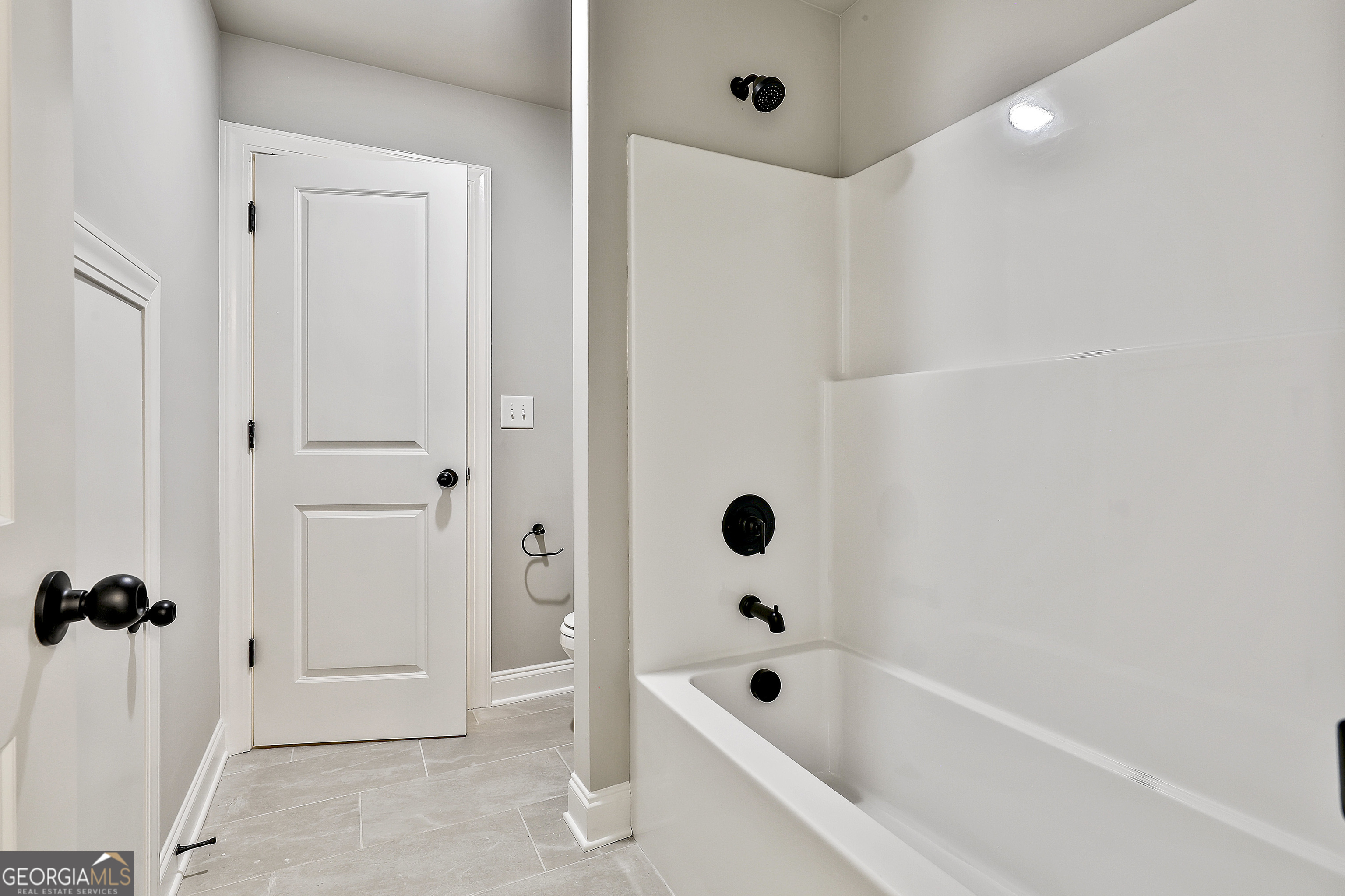 779 Alex Stephens Road Moreland, GA 30259 - Photo 45 of 54 a bathroom with a bathtub