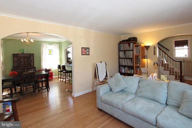 804 Rowen Road Silver Spring, MD 20910 - Photo 12 of 22 a living room with furniture and wooden floor