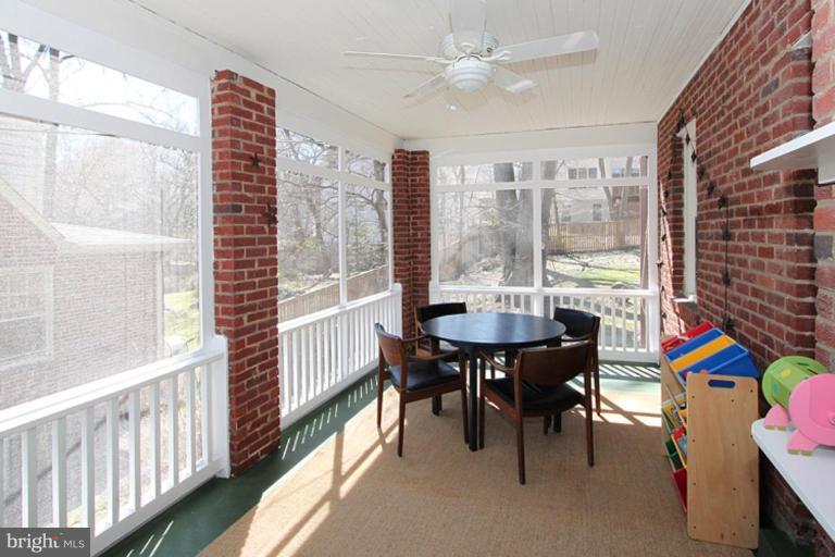 804 Rowen Road Silver Spring, MD 20910 - Photo 15 of 22 a view of a dining room with furniture window and outside view