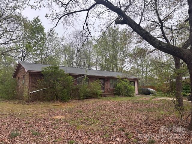 307 Brook Street Salisbury, NC 28146 - Photo 8 of 8 a view of a house with a yard