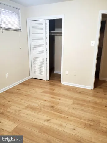 a bathroom with a glass door shower