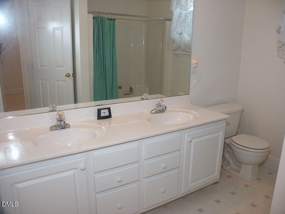 3319 Swinford Court Raleigh, NC 27604 - Photo 14 of 19 Upstairs Hall Bathroom