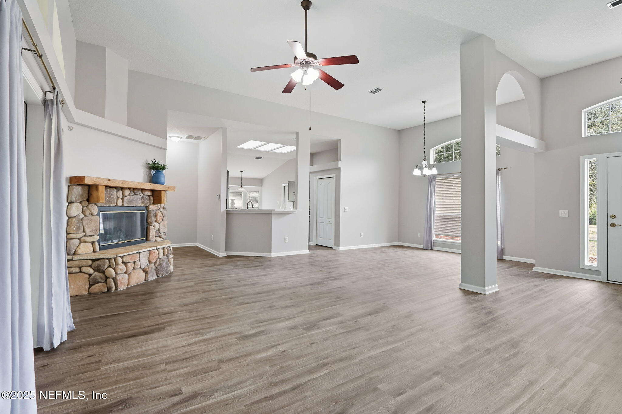 2064 Louie Carter Road Jacksonville, FL 32234 - Photo 25 of 46 a view of a livingroom with wooden floor