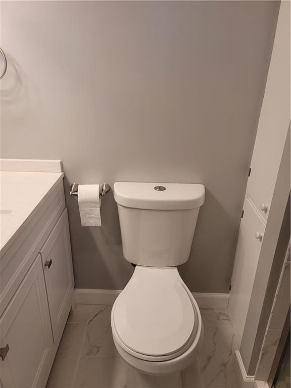 2212 Colonial Circle Gainesville, GA 30501 - Photo 29 of 57 a bathroom with a toilet and a sink