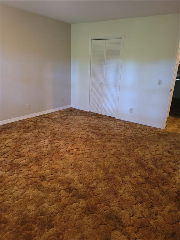 2212 Colonial Circle Gainesville, GA 30501 - Photo 33 of 57 an empty room with an entryway