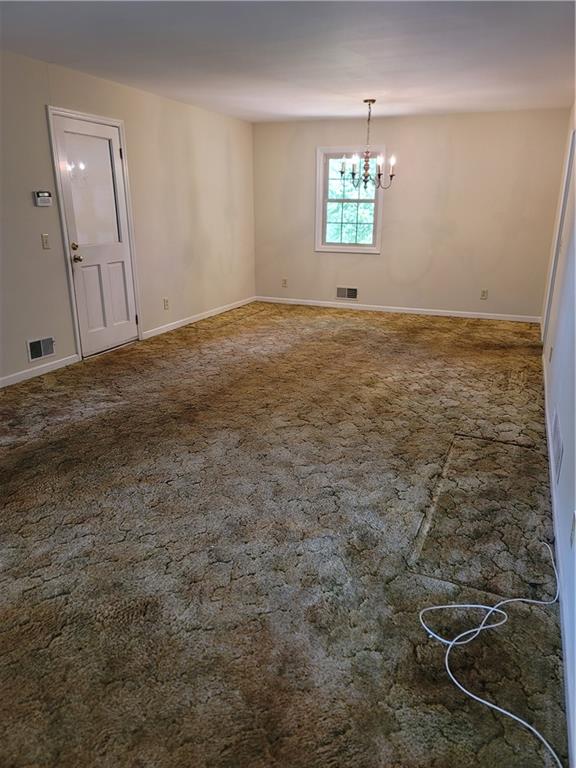 2212 Colonial Circle Gainesville, GA 30501 - Photo 4 of 57 an empty room with windows
