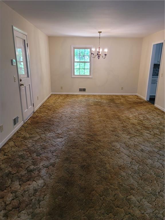 2212 Colonial Circle Gainesville, GA 30501 - Photo 6 of 57 an empty room with windows