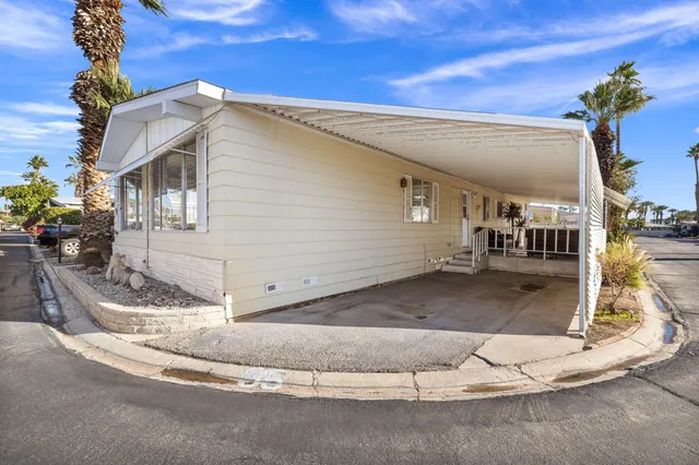 a view of a house with a garage