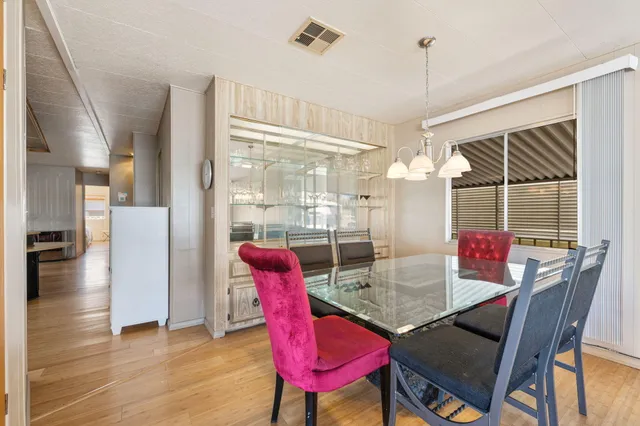a view of a dining room with furniture
