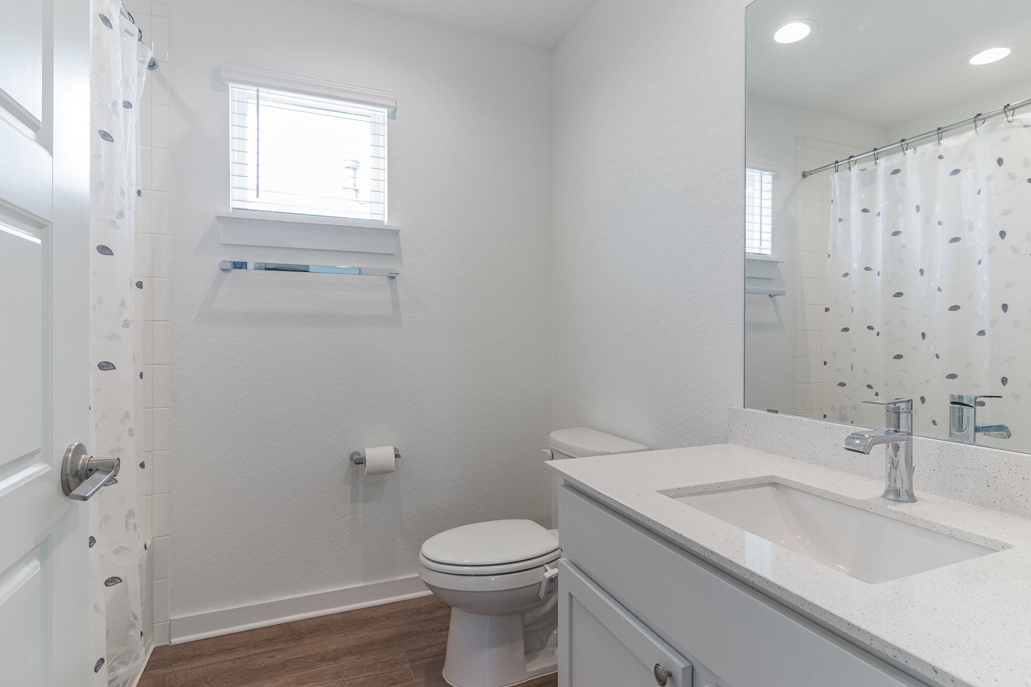 116 Century Plant Road Leander, TX 78641 - Photo 18 of 30 Clean lines and a stone vanity highlight this functional bathroom.