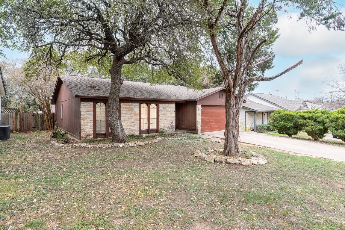 5603 Porsche Lane Austin, TX 78749 - Photo 20 of 25 a tree in front of a white house