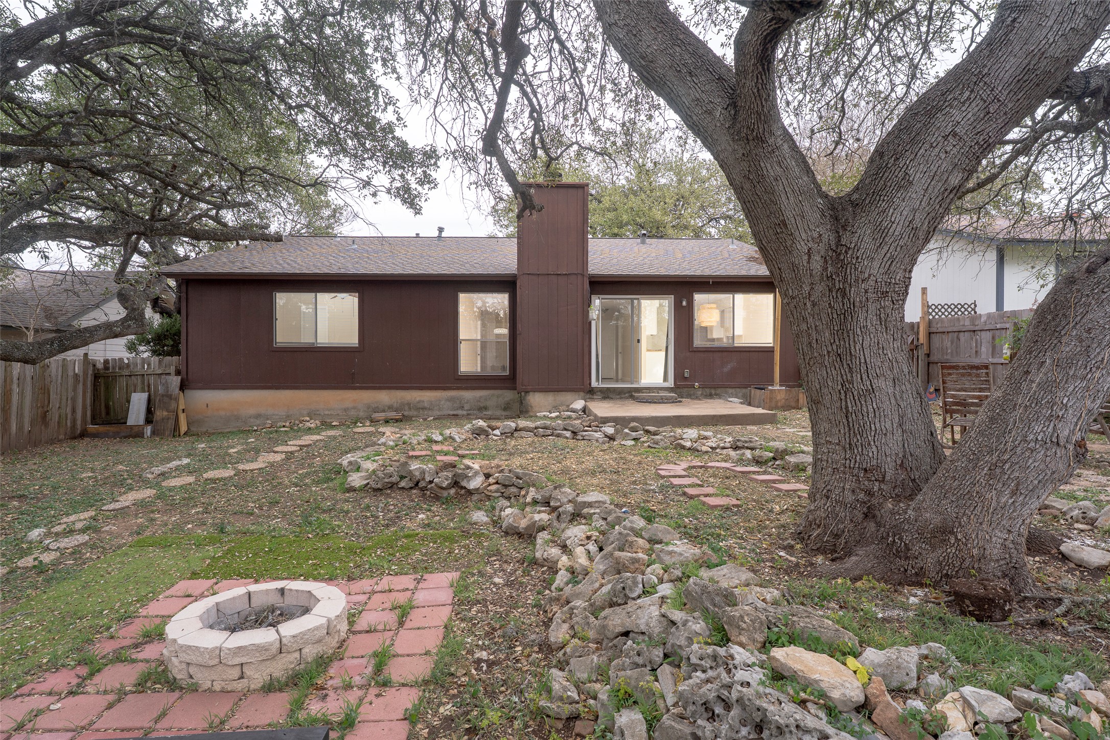 5603 Porsche Lane Austin, TX 78749 - Photo 21 of 25 a front view of a house with a yard and garage