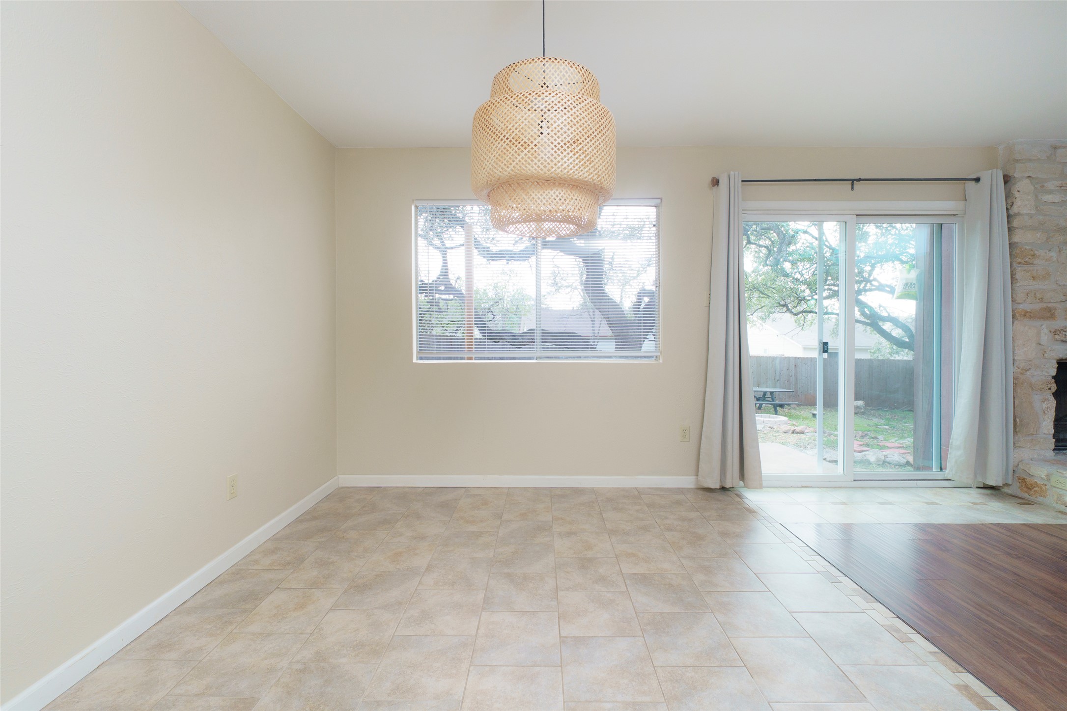 5603 Porsche Lane Austin, TX 78749 - Photo 7 of 25 an empty room with windows and outdoor view