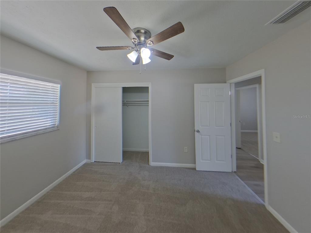 Undisclosed Address Brandon, FL 33510 - Photo 14 of 17 a view of an empty room with a window