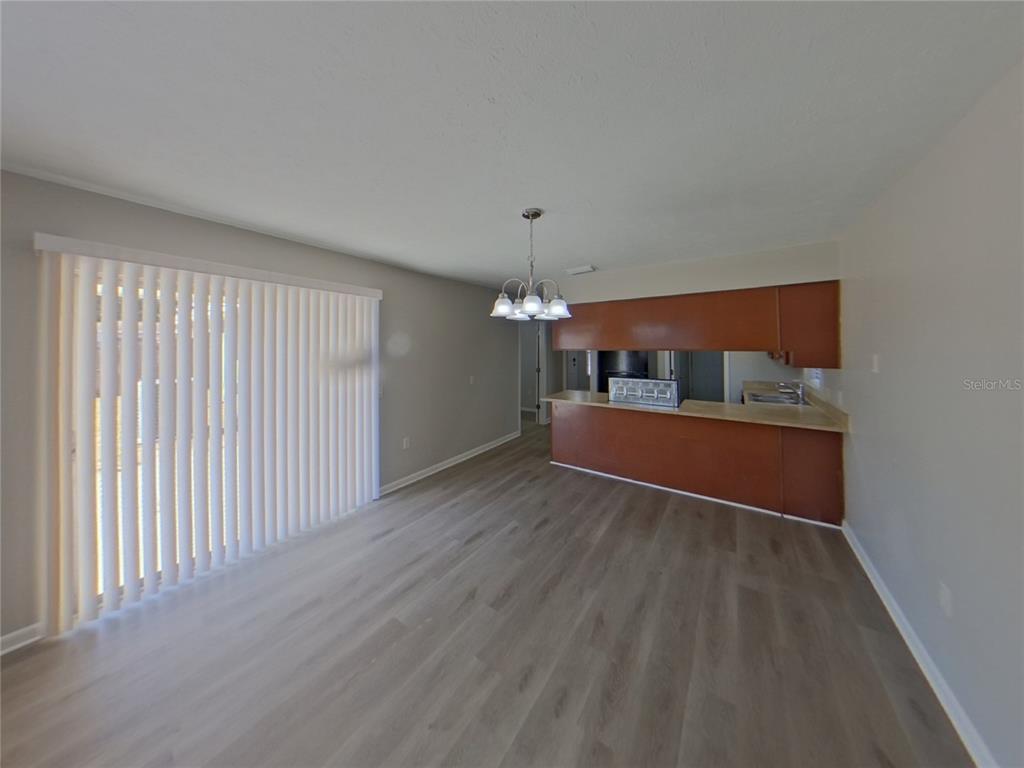 Undisclosed Address Brandon, FL 33510 - Photo 3 of 17 a view of a room with wooden floor