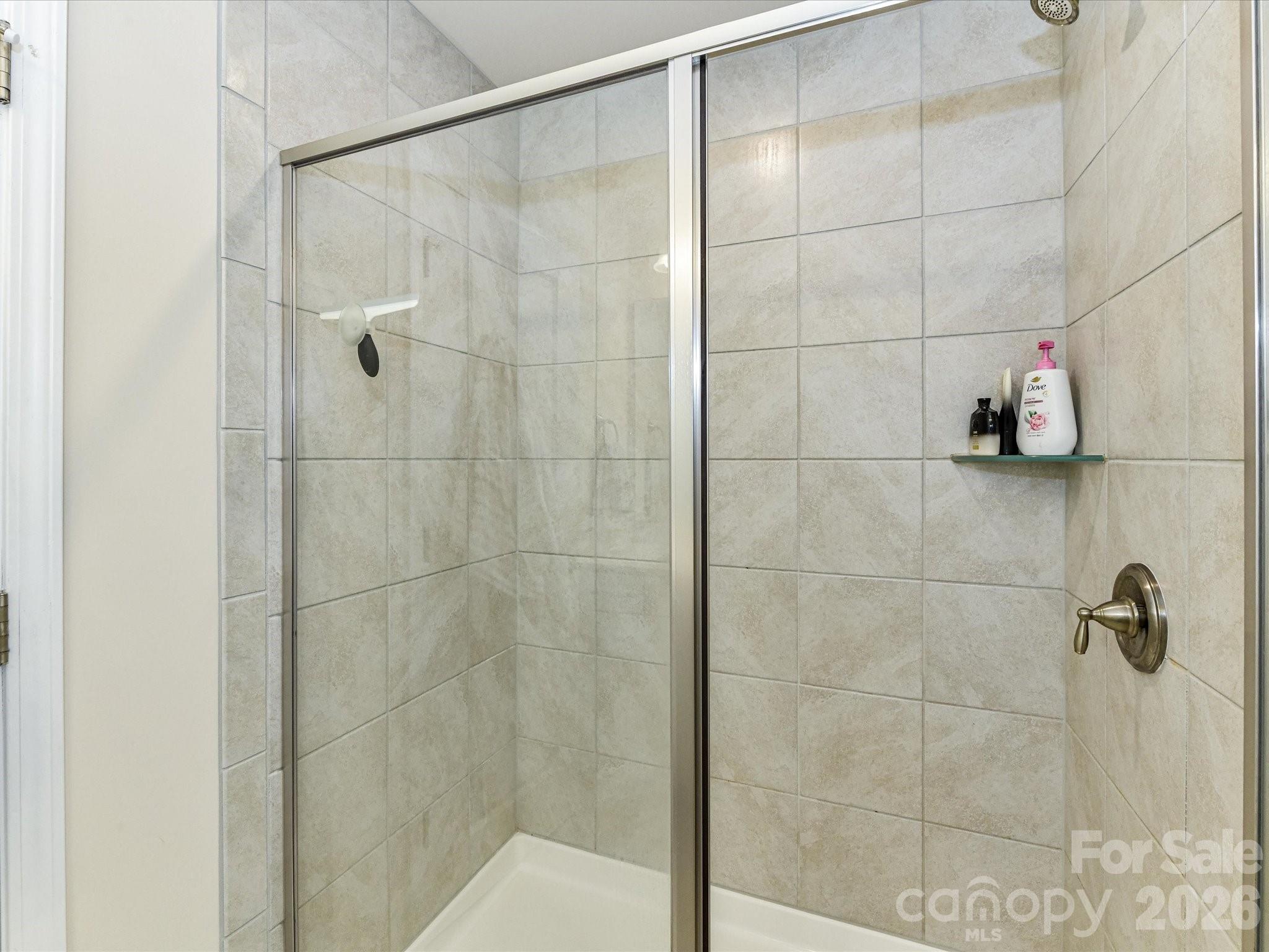 806 Canoe Song Road Fort Mill, SC 29708 - Photo 20 of 39 a bathroom with a shower