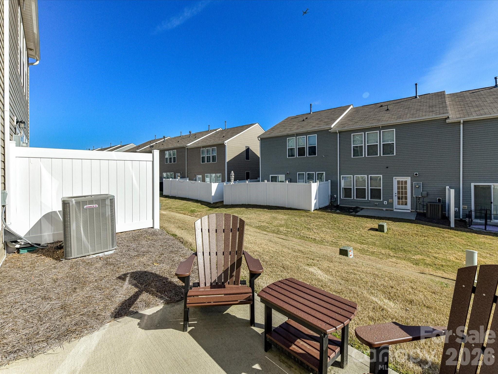 806 Canoe Song Road Fort Mill, SC 29708 - Photo 28 of 39 a front view of a house with swimming pool outdoor seating