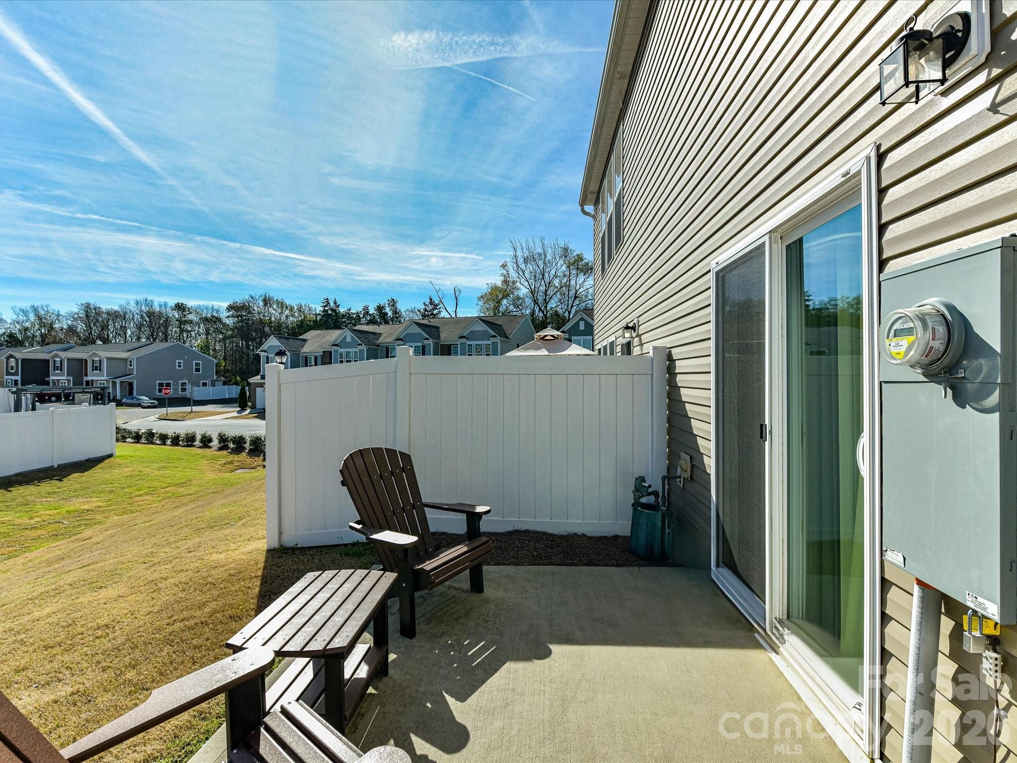 806 Canoe Song Road Fort Mill, SC 29708 - Photo 29 of 39 a view of a balcony with chair and table