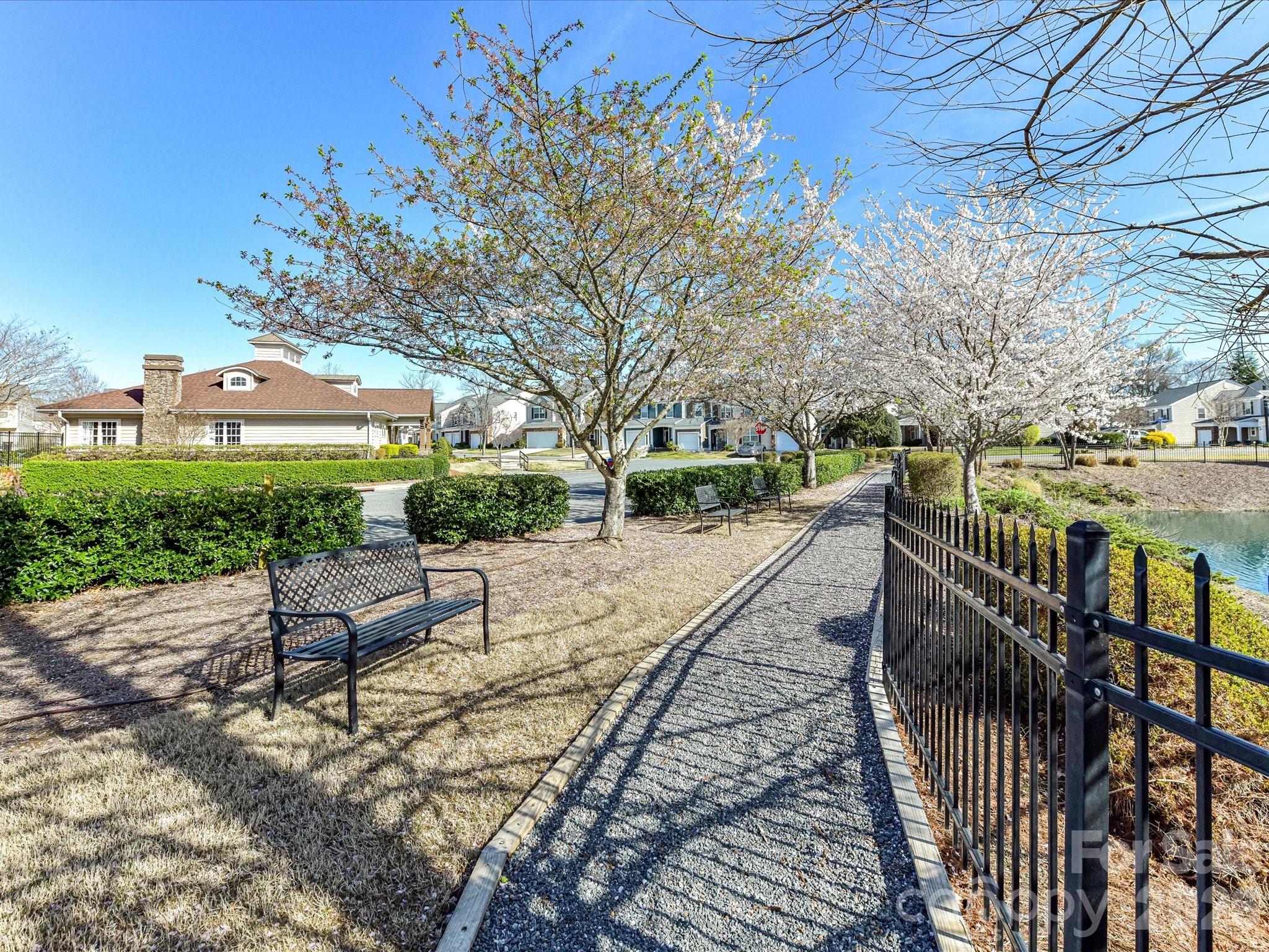 806 Canoe Song Road Fort Mill, SC 29708 - Photo 33 of 39 a view of a bench in a backyard