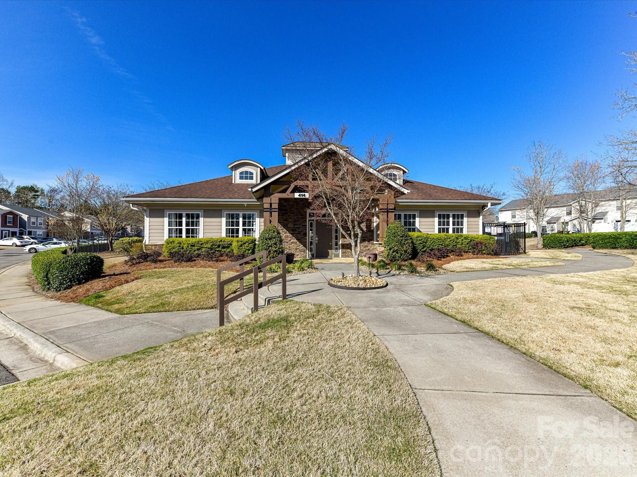 806 Canoe Song Road Fort Mill, SC 29708 - Photo 35 of 39 a view of a house with swimming pool and sitting area