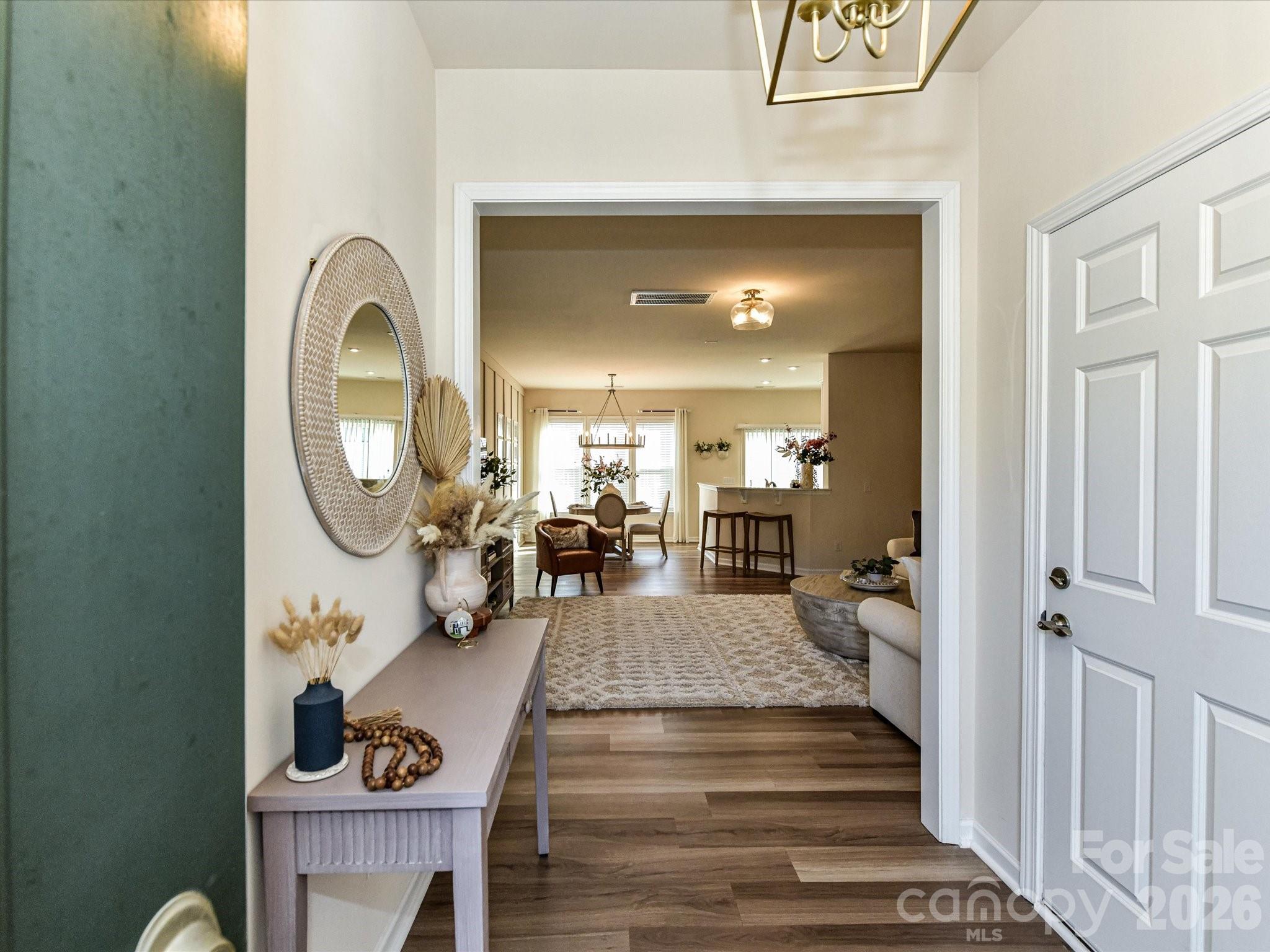 806 Canoe Song Road Fort Mill, SC 29708 - Photo 4 of 39 a lobby with furniture and a mirror