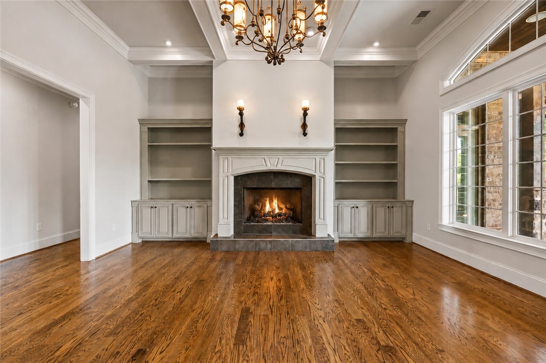 114 Willowbend Drive Anderson, SC 29621 - Photo 10 of 50 This living area features a warm fireplace and ample natural light through large windows.