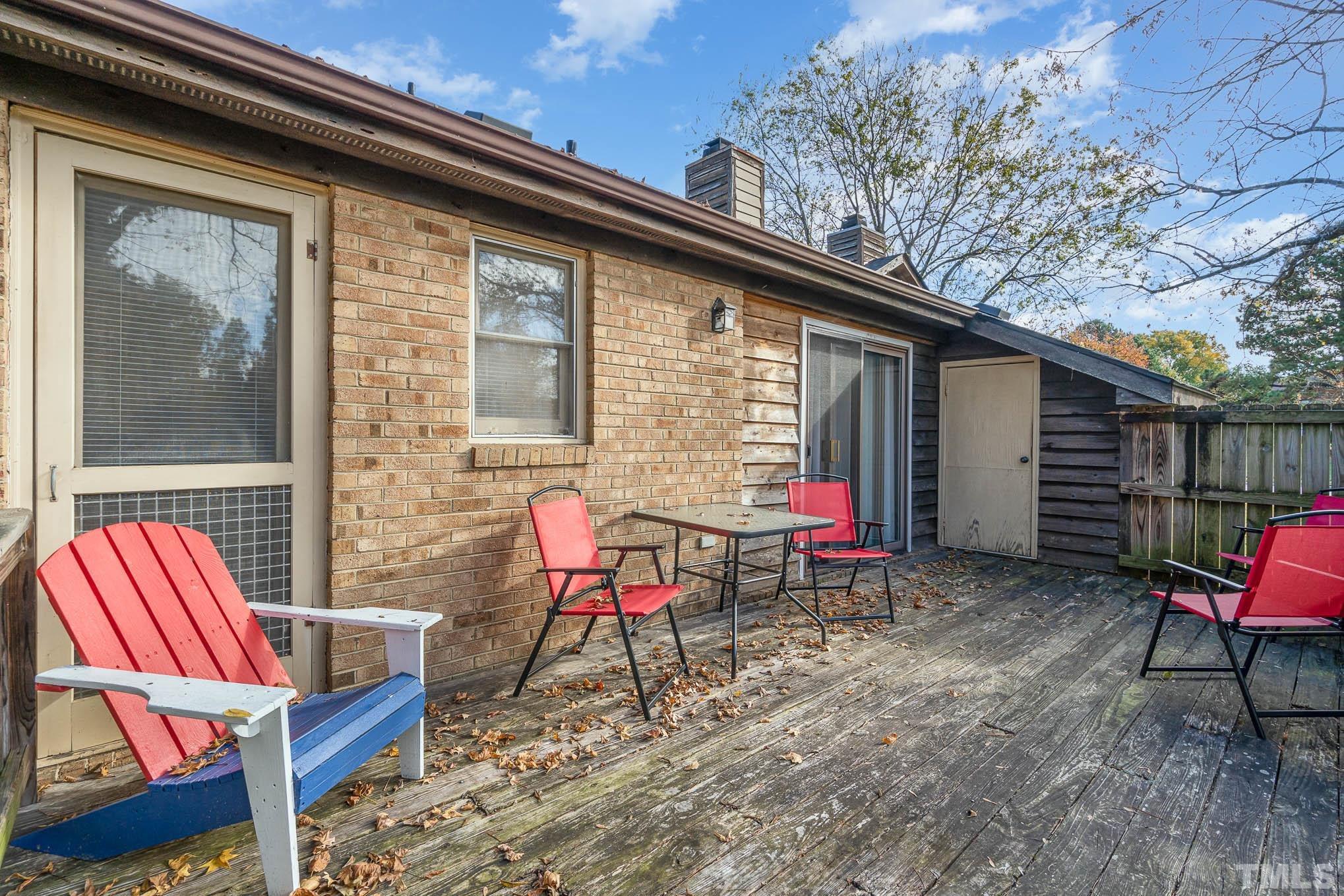 4701 Courtside Place Raleigh, NC 27604 - Photo 16 of 30 a backyard of a house with outdoor seating