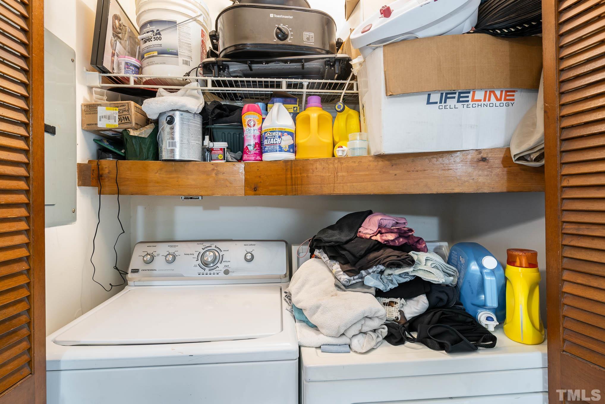 4701 Courtside Place Raleigh, NC 27604 - Photo 25 of 30 a utility room with dryer and washer