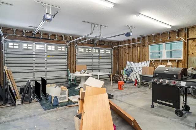 a table and chairs under an umbrella