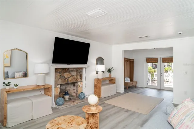 a living room with furniture and a table