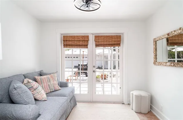 a bedroom with a bed and a lamp