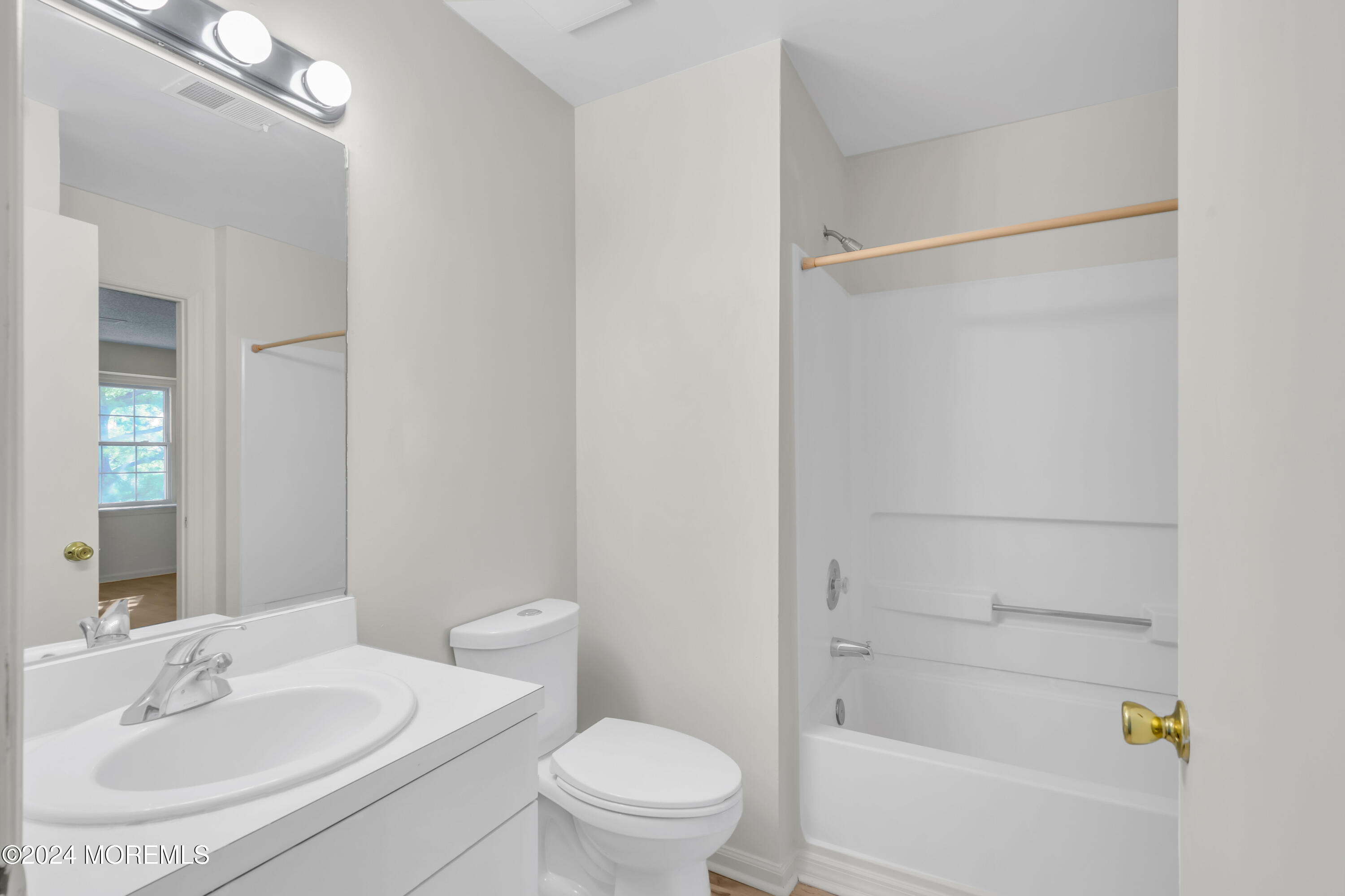 130 Edpas Road, Unit 130 New Brunswick, NJ 08901 - Photo 8 of 16 a bathroom with a sink toilet and shower