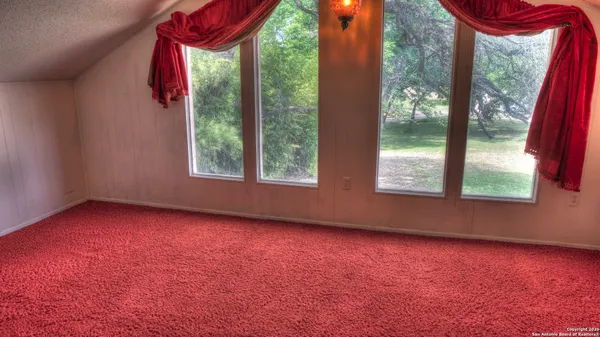 a view of a livingroom with a staircase