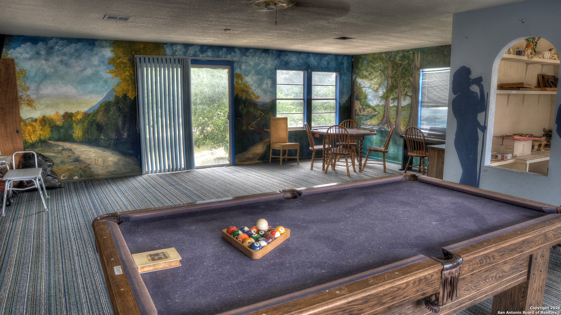 6623 Ranch Road 1120 Rio Frio, TX 78879 - Photo 22 of 25 a living room with furniture and a table